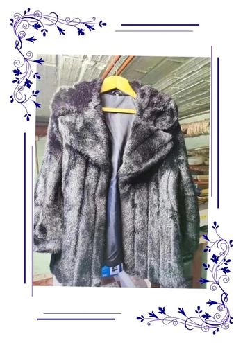 Veste fausse fourrure noire 42