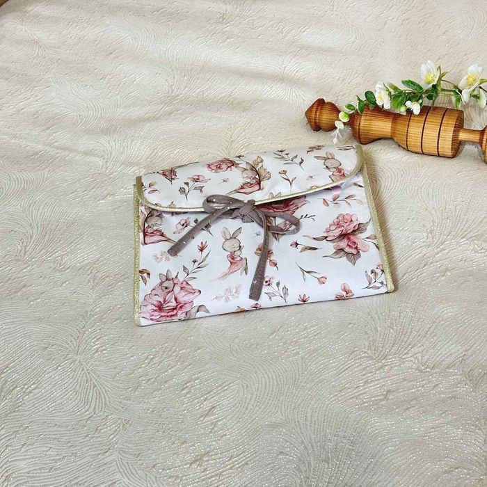 Tapis à langer nomade lapin rose