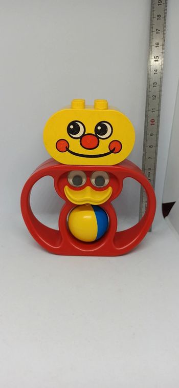 Brique en forme de tête avec hochet canard lego duplo vintage