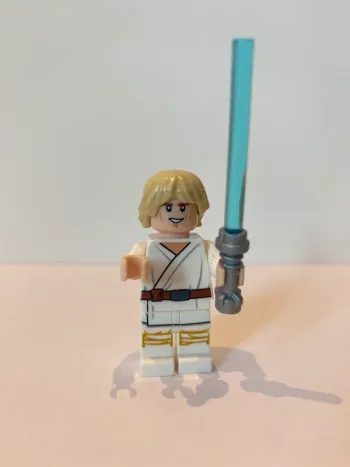 Figurine type lego Jedi Luke Skywalker enfant. Star Wars