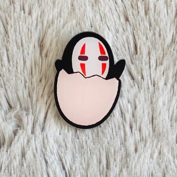 Broche No Face