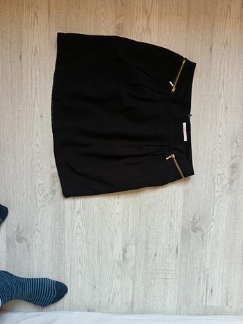 Mini jupe noire taille 36 S très bon état camaieu