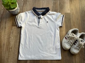 - Polo Okaidi - 6 ans  - Très bon état, mini tache dans le dos