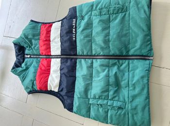 Magnifique blouson sans manches de la marque IKKS réversible en taille 14 ans