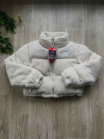 Doudoune The north face / moumoute/ sherpa
