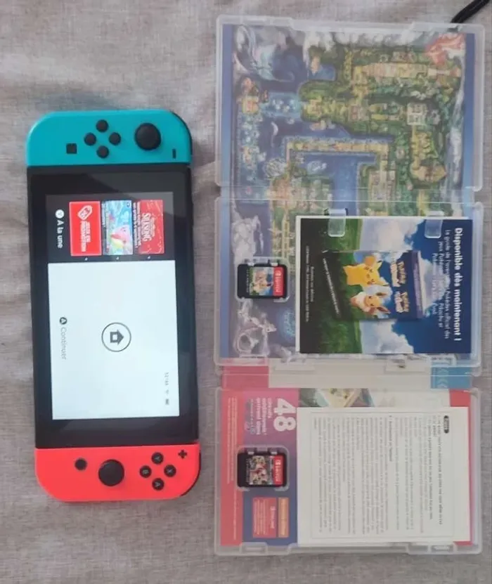 Nintendo Switch + 2 jeux inclus – Très bon état