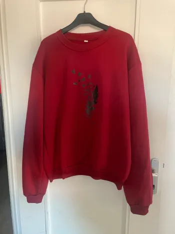 Pull imprimé rouge