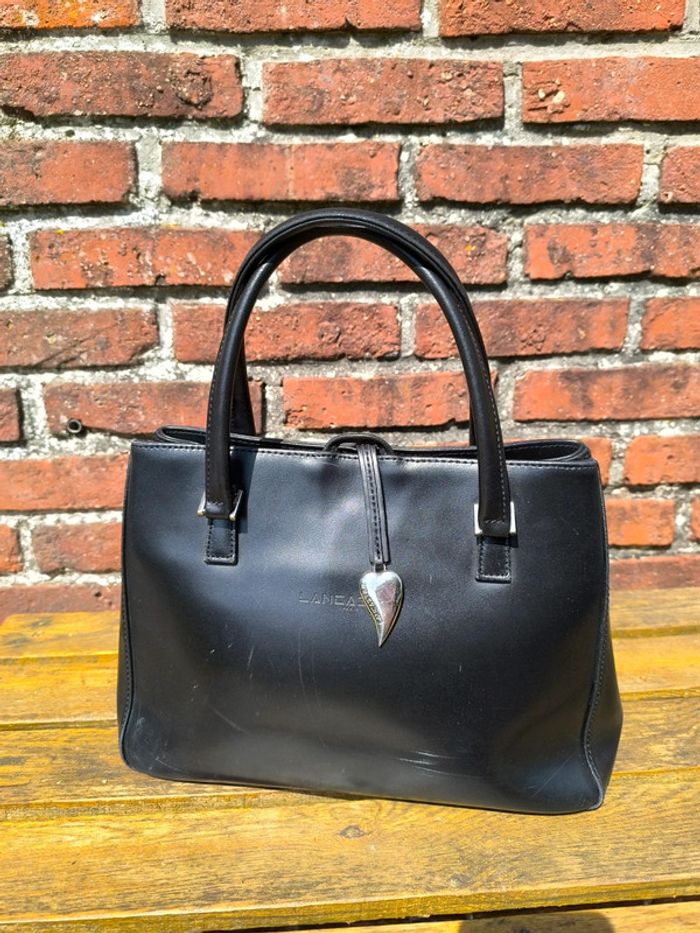 Sac a main cuir noir et rouge Lancaster bon état