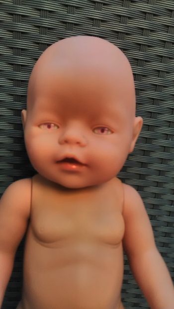 poupon  avec yeux rose  zapf création