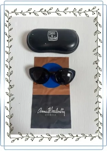 Lunettes de soleil Solento noir, très bon état