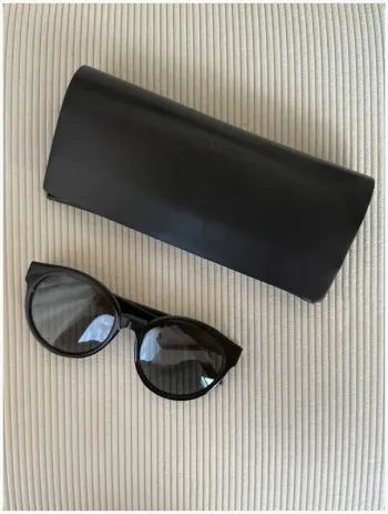 Lunettes de soleil Saint Laurent très bon état