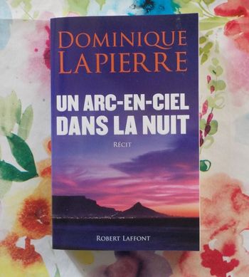 UN ARC-EN-CIEL DANS LA NUIT récit par Dominnique LAPIERRE Ed. Laffont