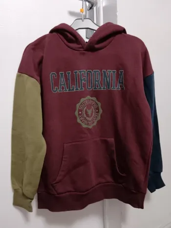 Pull à capuche Kiabi Taille 12 ans