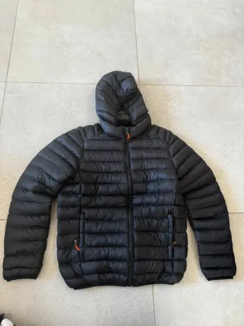 Doudoune noir en très bon état, 175/92A, noté taille XL, pour femme