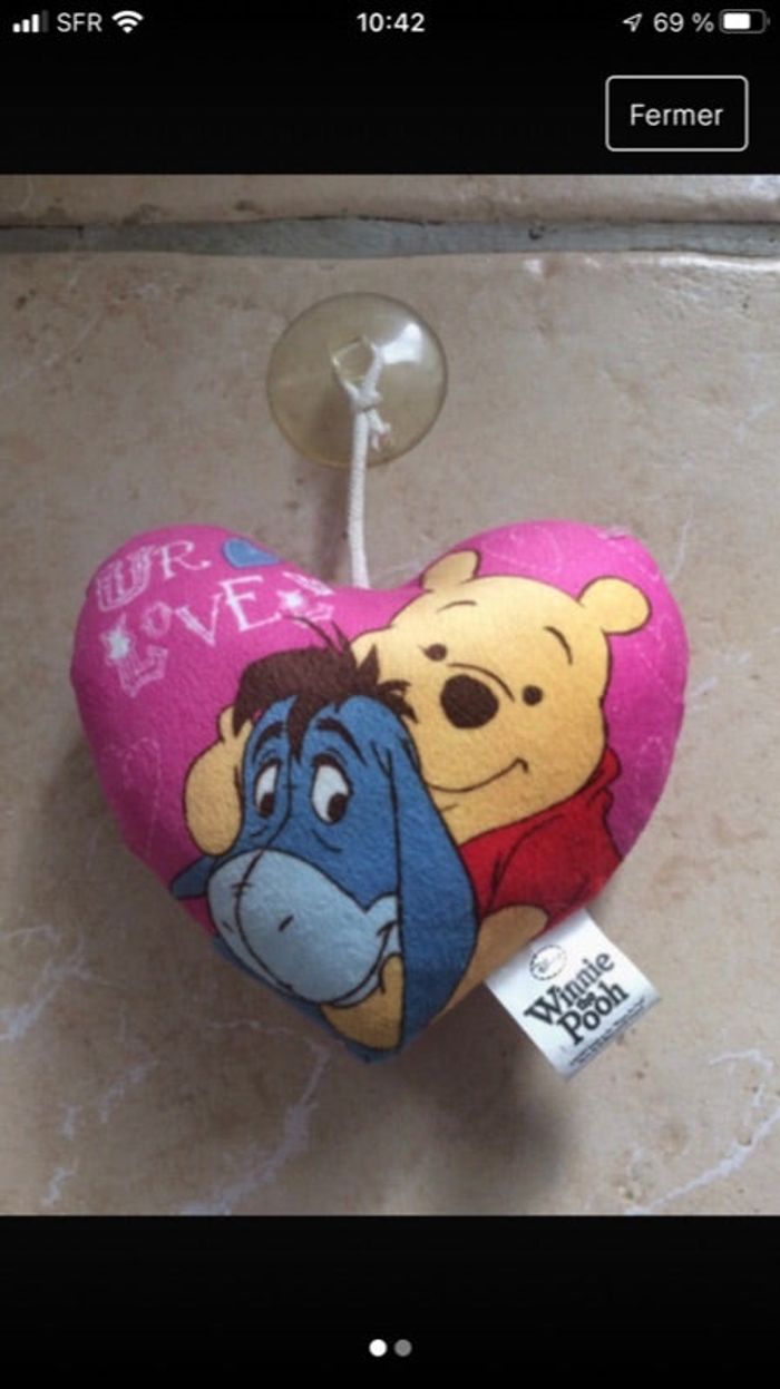 Peluche coeur winnie l’ourson