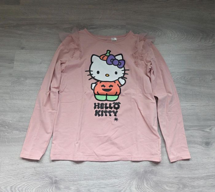 🌸 Blouse longue manche hello kitty et volant 10 ans 🌸