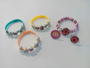 Lot bijoux fille disney raiponce miraculous Vaiana bracelets bagues