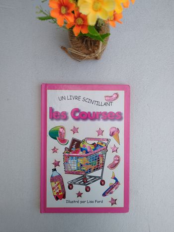 Livre scintillant Les courses