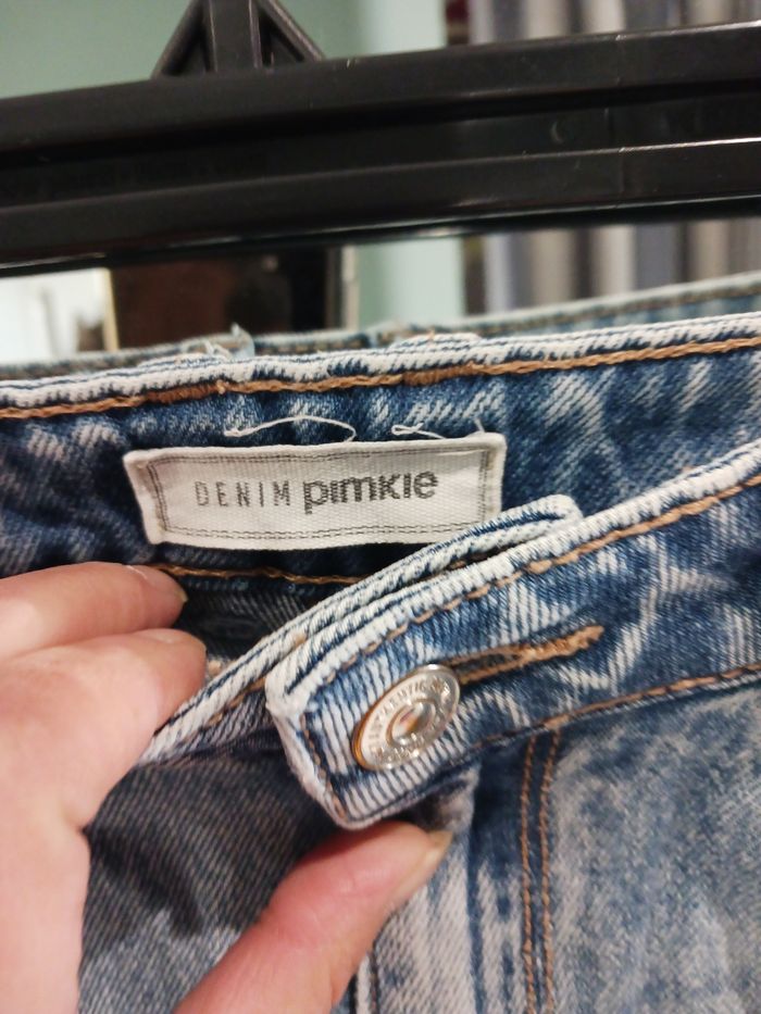 Jeans troué - photo numéro 3