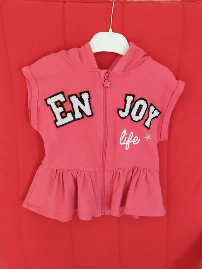 Gilet sans manches à capuche