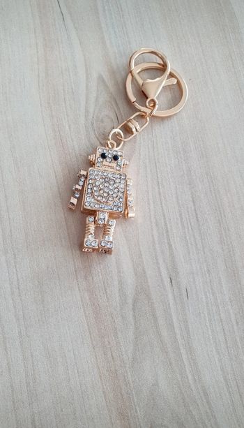 Porte clé robot doré et strass