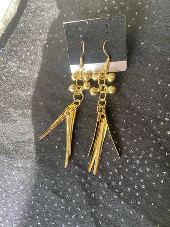Boucles d'oreilles pendantes dorées inoxydables