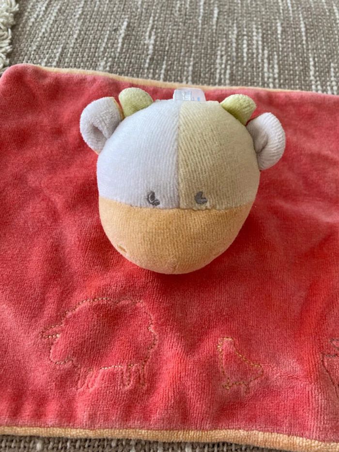 Peluche doudou plat 20cm Sucre d'Orge vache rouge et orange très bon état - photo numéro 2