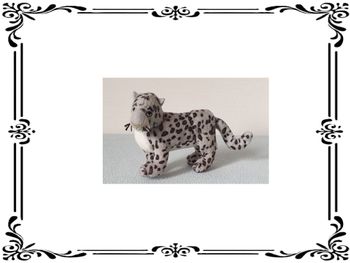 Peluche panthère grise.