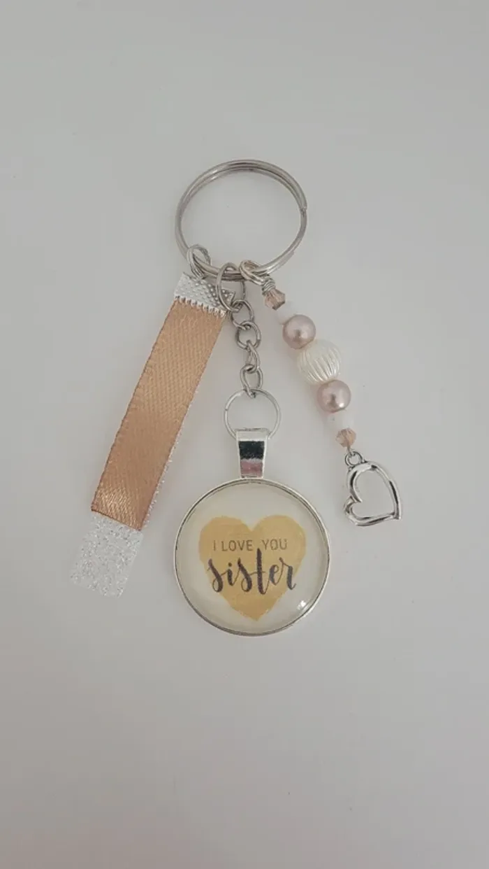 Porte clé message bijoux de sac " i love you sister"