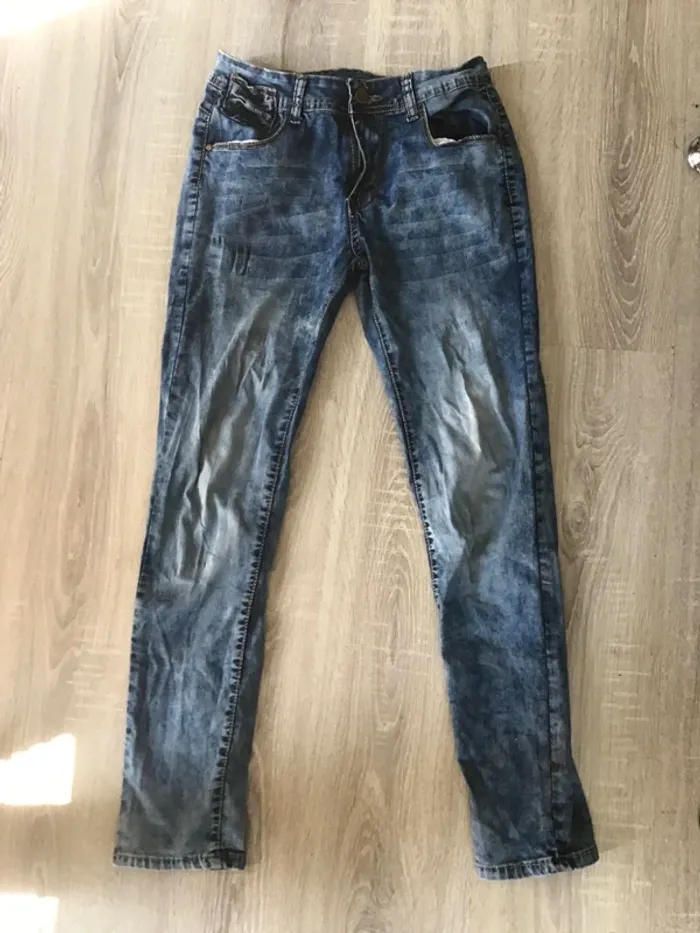 Jean femme avec noeuds sur les poches