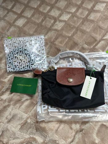 Sac longchamp avec bandoulières 
