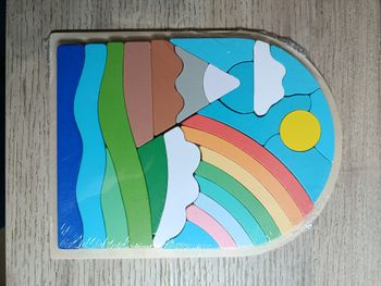 Puzzle en bois arc en ciel