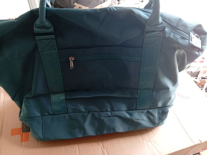 Sac de voyage et ses trousses