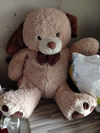 Grosse peluche chien marron