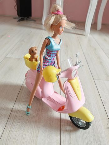 Scooter barbie et son chien