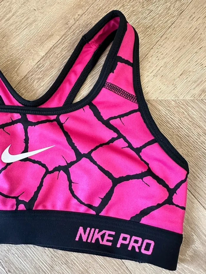 Brassière de sport Nike rose et noir taille 34 - photo numéro 2