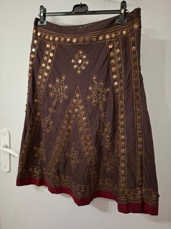 Jupe promod taille 42 en très bon état (petit défaut manque un rond voir la photo légèrement visible 