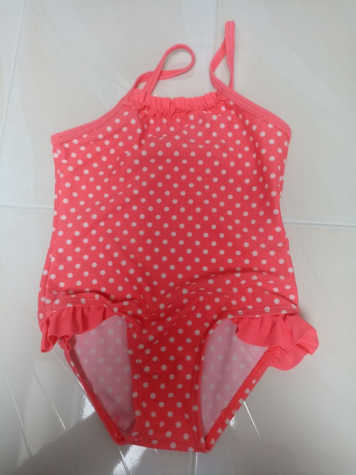 Maillot de bain rose à pois blanc