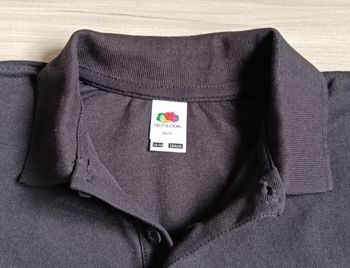 Polo à manches longues de couleur noire. Taille 14-15 ans