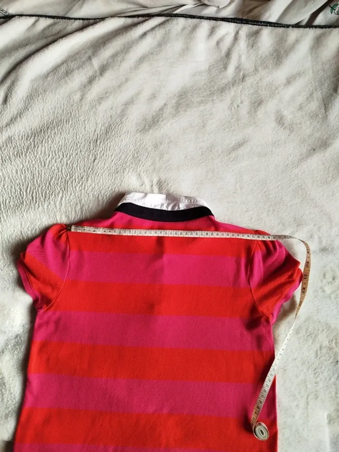 Polo femme Lacoste orange et rose avec col blanc - photo numéro 10