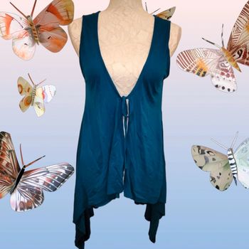 Gilet long sans manches 🚺