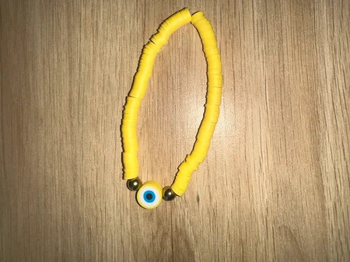 bracelet fushia œil jaune