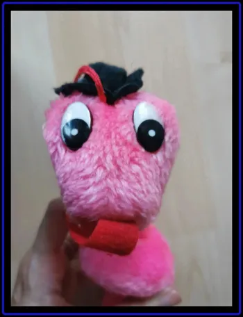 Peluche serpent rose