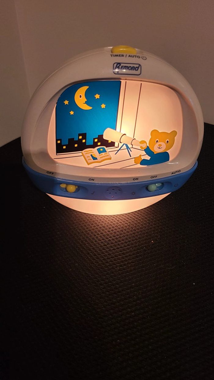 Veilleuse musicale pour berceau Ours Astronome raymond