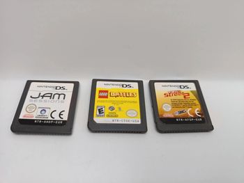 Lot 3 jeux Nintendo Ds occasion 1): jam sessions / 2): Lego battles / 3): fifa street 2