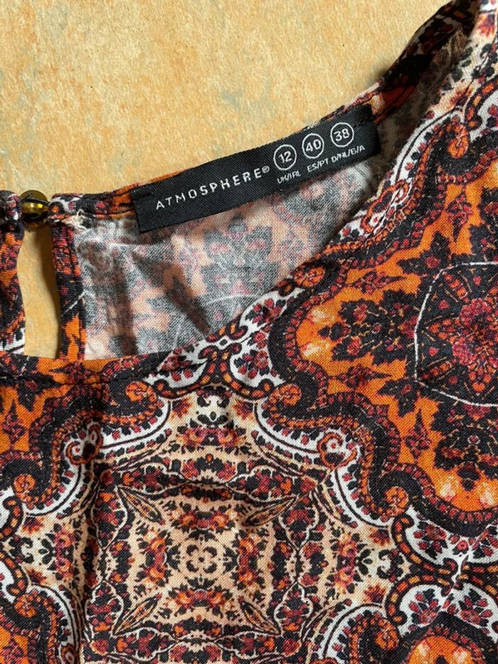 Top à motifs géométriques tons orangés Primark taille M très bon état - photo numéro 4