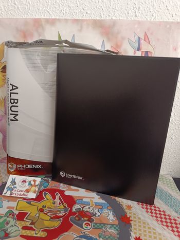 PHOENIX SHIELD - Album noir - 396 places - NEUF