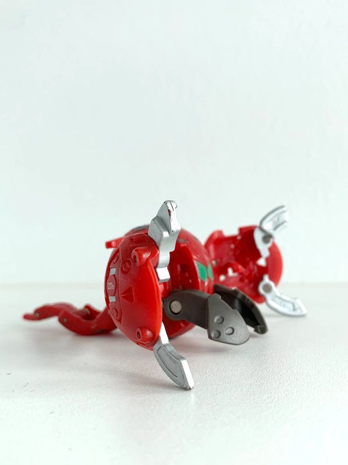 Bakugan Baku Sky Raiders Pyrus Reptak Mechtanium Surge 830G rouge - photo numéro 7