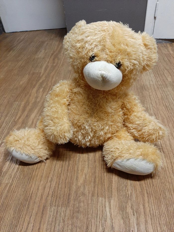 Grand nounours en peluche