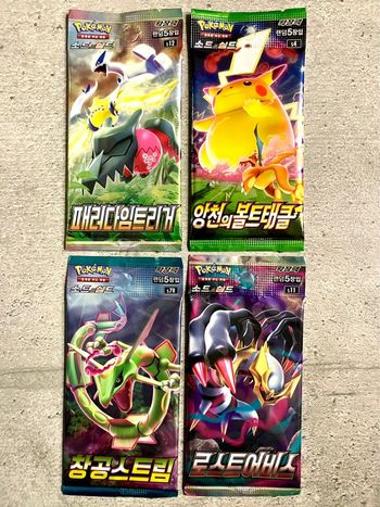Cartes Pokémon : 4 boosters neufs et officiels